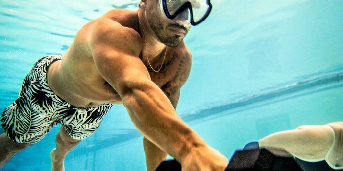 This Intense 4-Hour Fitness Workshop Takes Your Weights Underwater